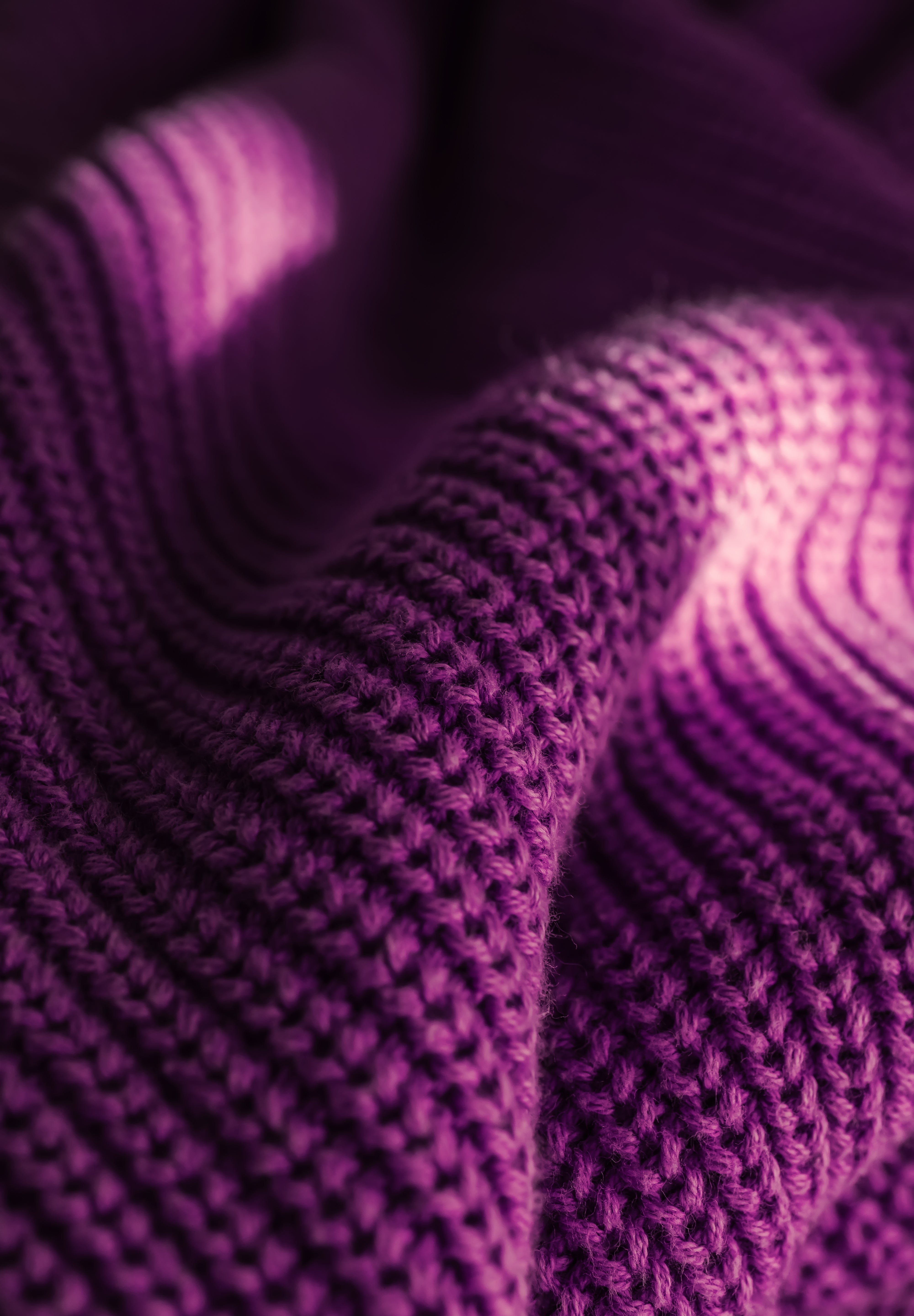knitted-texture-of-a-violet-sweater-or-scarf-close-2025-03-13-04-39-49-utc.jpg