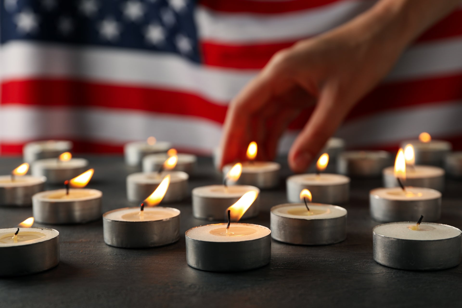 memorial-candles-with-an-american-flag-background-2026-03-24-23-11-01-utc.jpg