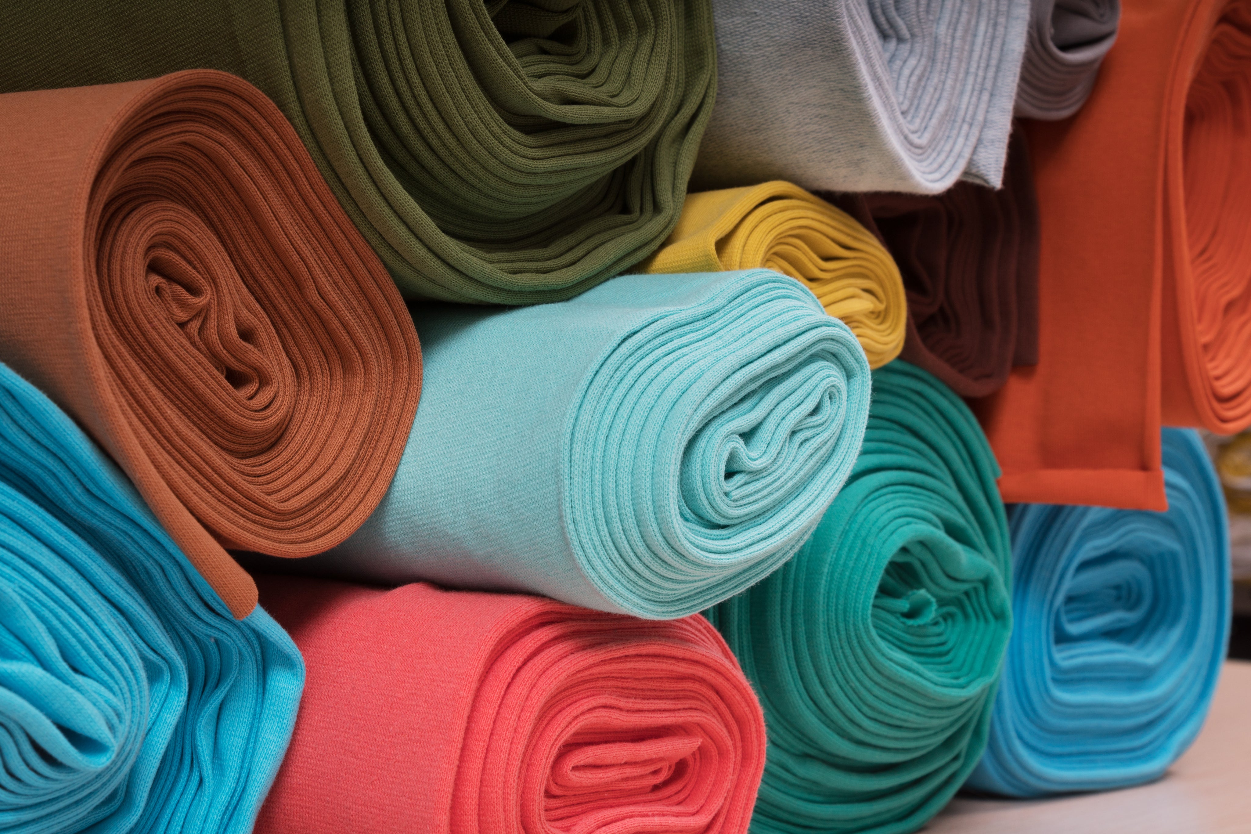 rolls-of-knitted-fabric-in-assortment-2025-01-09-12-25-43-utc.jpg